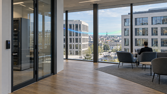 Modern corporate office with secure network infrastructure, illustrating Secure Access Service Edge (SASE) connectivity.