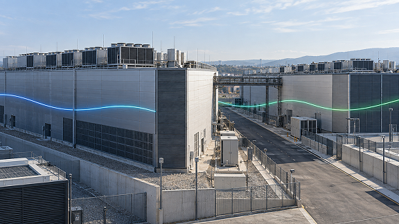 Data center facilities connected by a digital network link, illustrating SD-WAN connectivity.